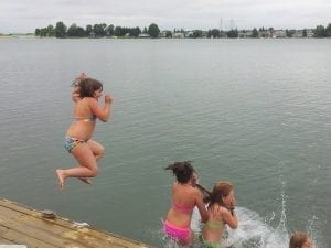 Swimming off of our dock.